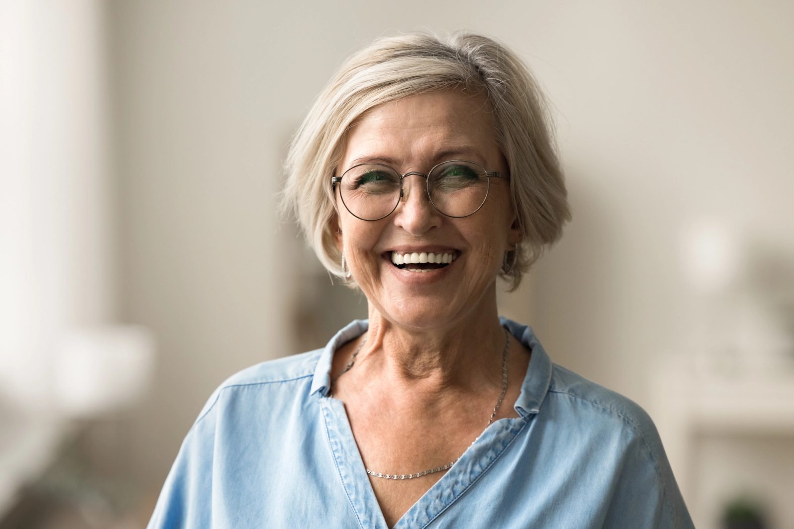 Patient smiling before endodontic care